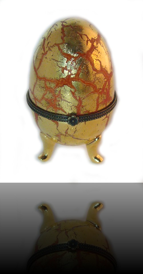 oeuf gaine orange et or