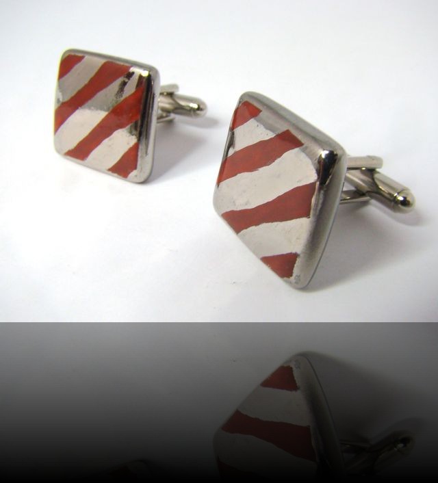 bouton de manchette rouge platine